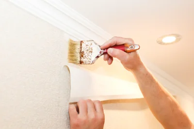 Pose de papier peint à la Racineuse — revêtements muraux et toiles de verre